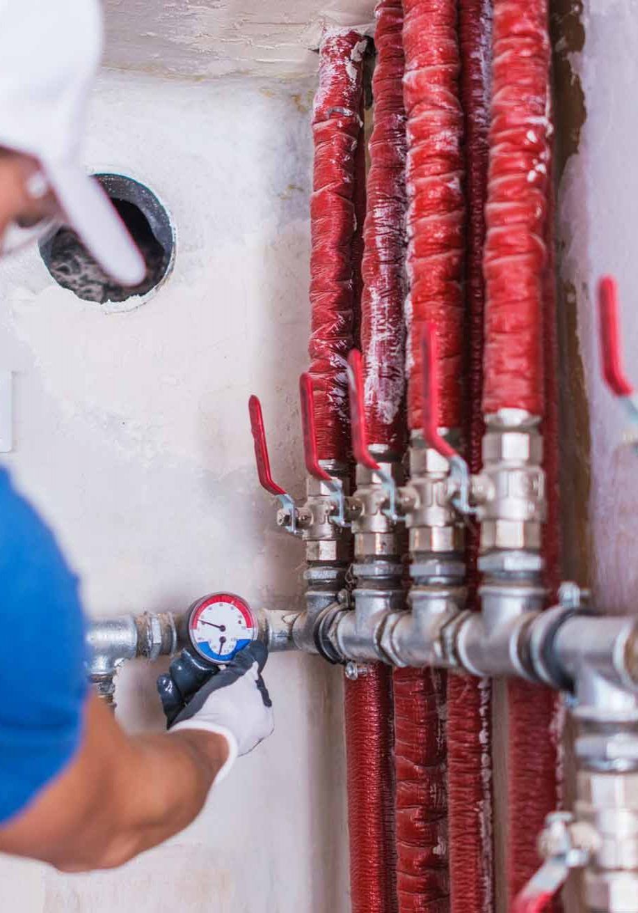 plumber-checking-water-supply-scaled